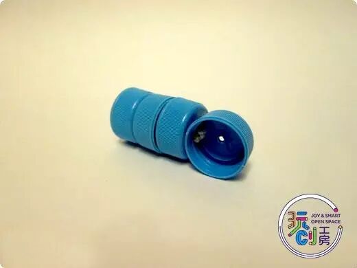 DIY Crafting a Cool Bottle Cap Robot from Recycled Caps