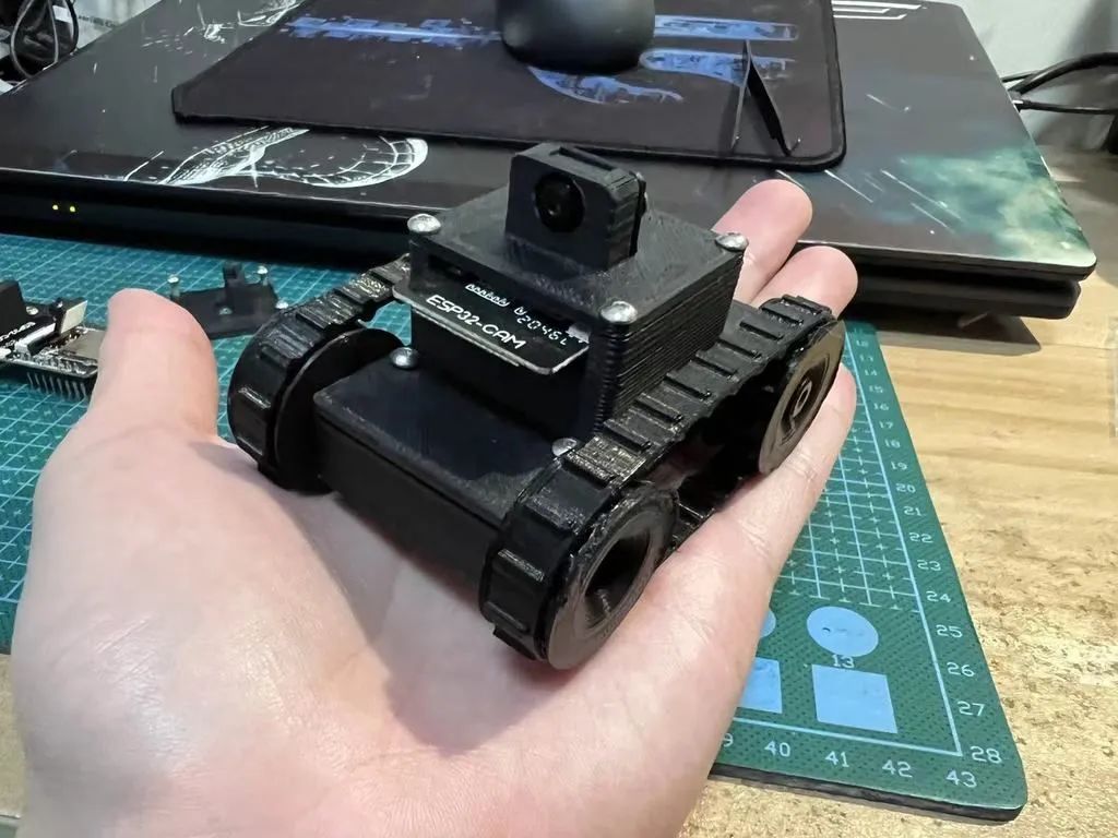 FPV - Tracked Vehicle: 3D Printed Remote-Controlled Mini FPV Tank with Modular Design, ESP32 Control, and Robotic Arm Base