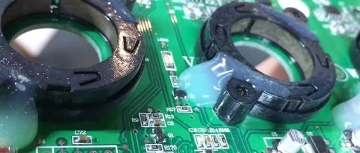 What is the White Translucent Substance on the PCB?