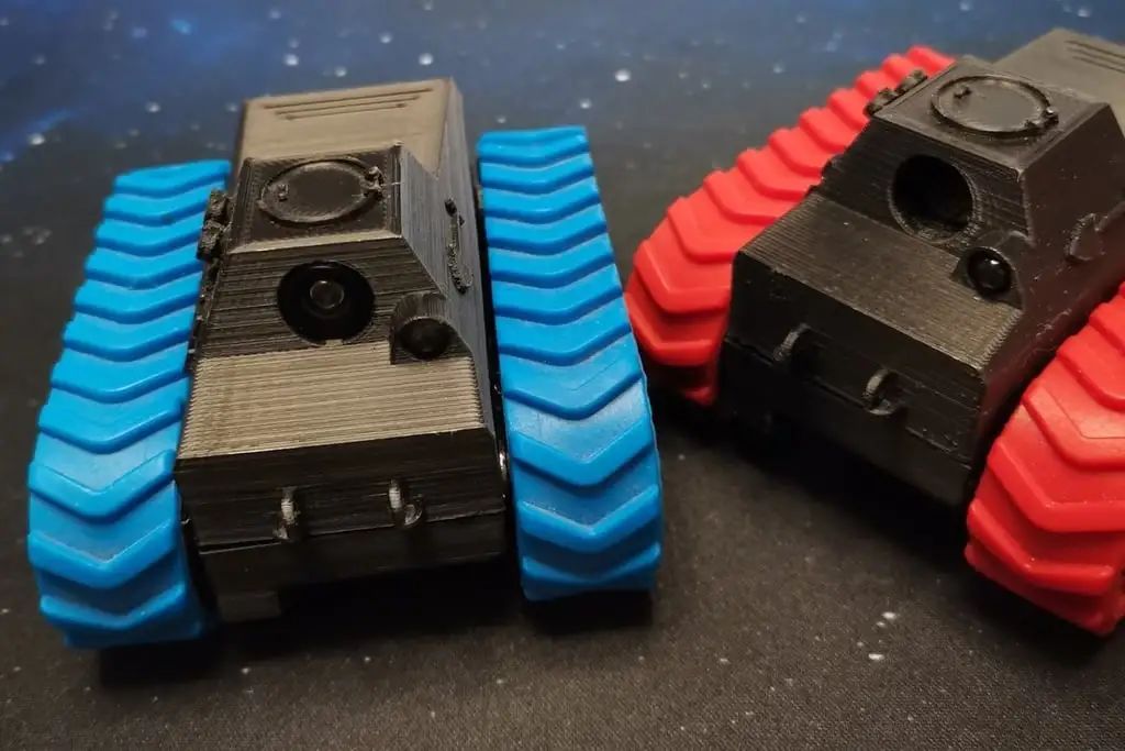 FPV - Tracked Vehicle: 3D Printed Remote-Controlled Mini FPV Tank with Modular Design, ESP32 Control, and Robotic Arm Base