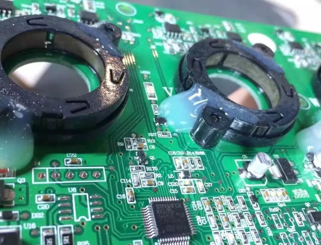 What is the White Translucent Substance on the PCB?