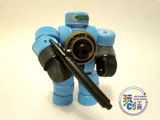 DIY Crafting a Cool Bottle Cap Robot from Recycled Caps