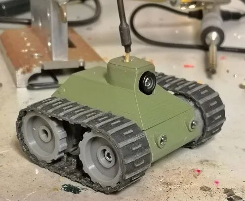 FPV - Tracked Vehicle: 3D Printed Remote-Controlled Mini FPV Tank with Modular Design, ESP32 Control, and Robotic Arm Base