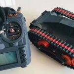 FPV - Tracked Vehicle: 3D Printed Remote-Controlled Mini FPV Tank with Modular Design, ESP32 Control, and Robotic Arm Base