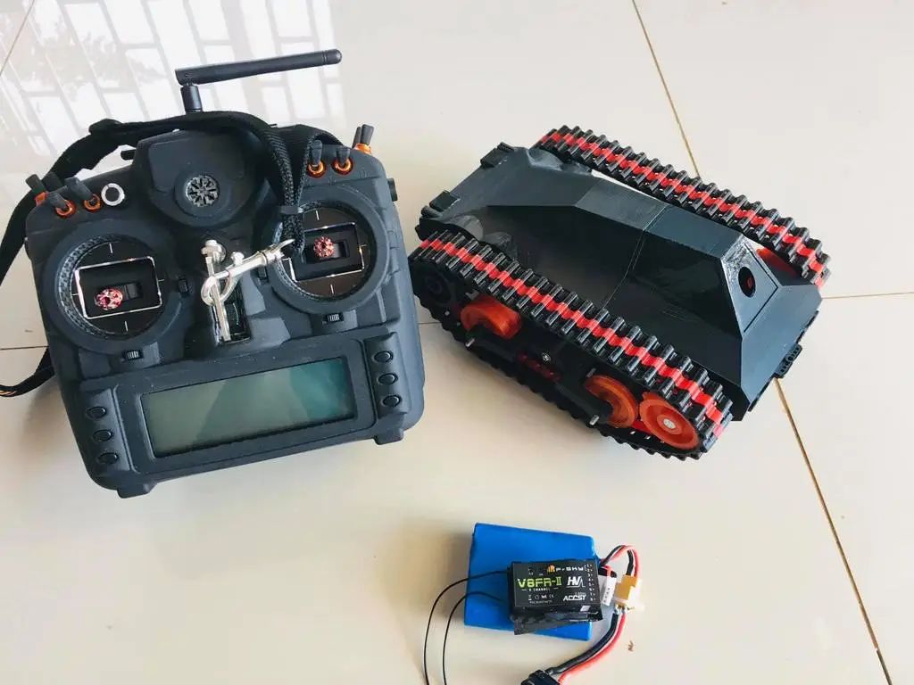 FPV - Tracked Vehicle: 3D Printed Remote-Controlled Mini FPV Tank with Modular Design, ESP32 Control, and Robotic Arm Base