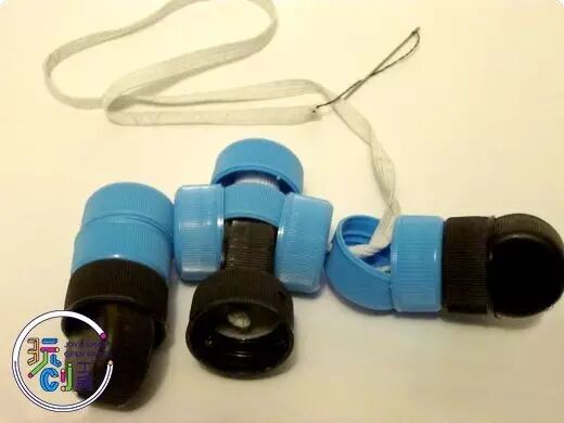 DIY Crafting a Cool Bottle Cap Robot from Recycled Caps