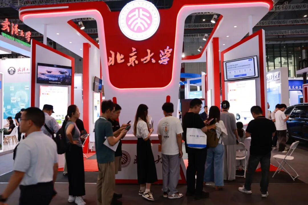 AI Diagnosis, Robot Traffic Control, and Mind-Controlled Wheelchairs: Long Lines at University Booths at the Industrial Expo