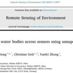 Unveiling Top Journals: Large-scale Mapping of Water Bodies Across Sensors Using Unsupervised Deep Learning