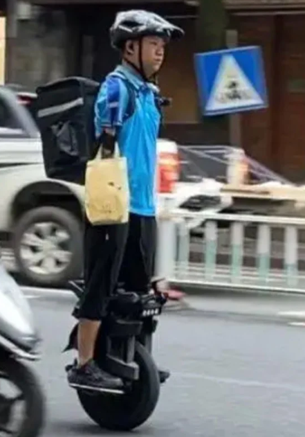 Armless Chinese Man Delivers Food on Unicycle