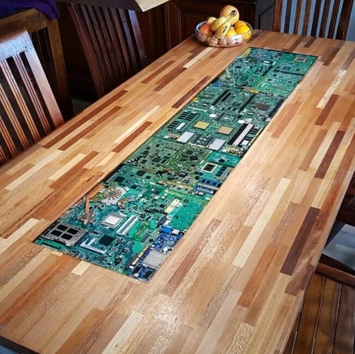 A Table Filled with Circuit Boards: A Unique Creation You Can't Buy
