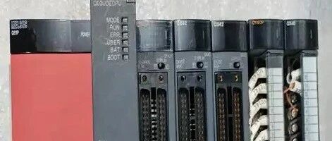 Application of Mitsubishi Q Series PLC Analog Output Module in Controlling Inverters