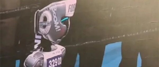 A Humorous Moment at the Robot Olympics: Champion Misses the Mark and Refuses to Shake Hands